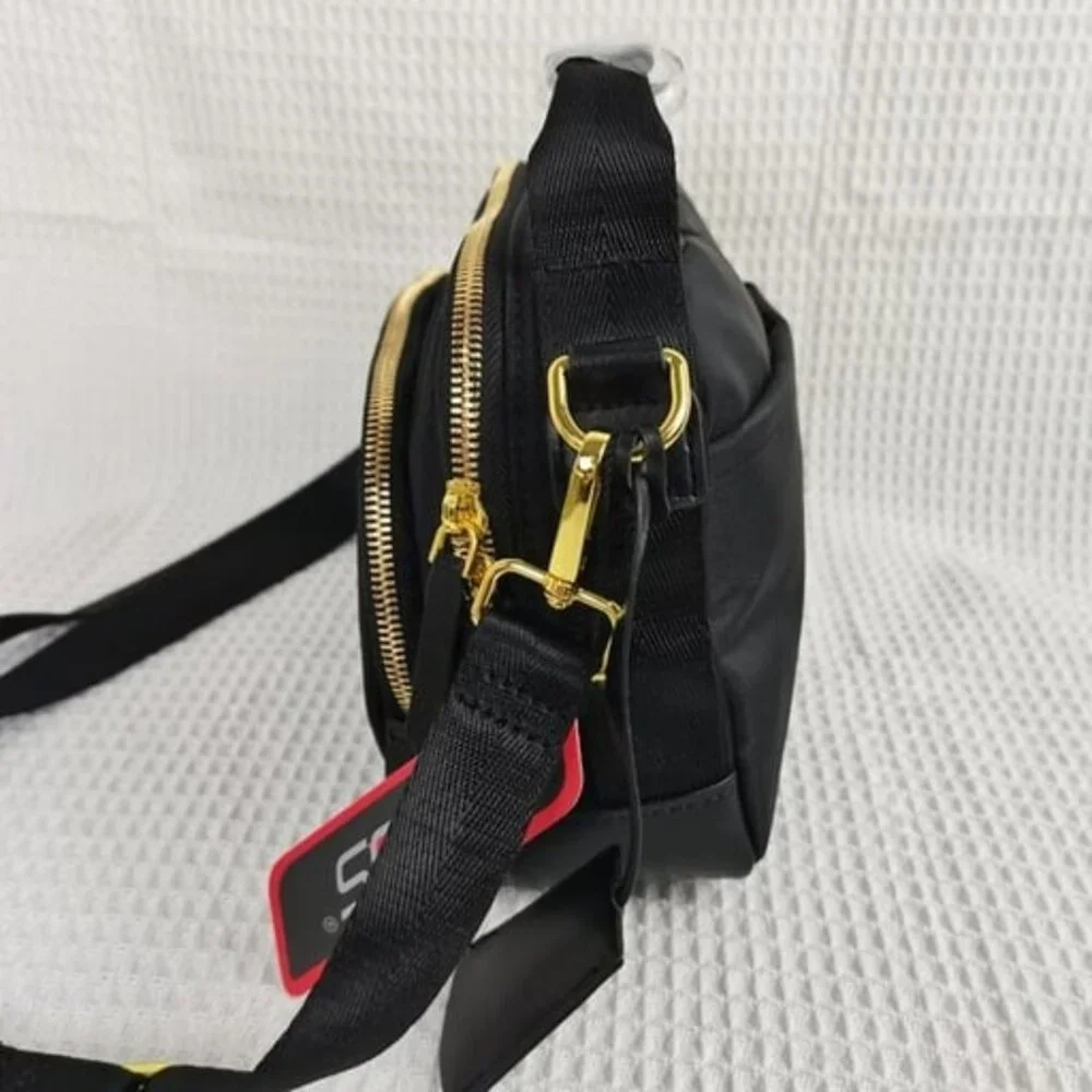 Tumi Voyageur Troy Zip Pocket Crossbody Bag in Black/Gold